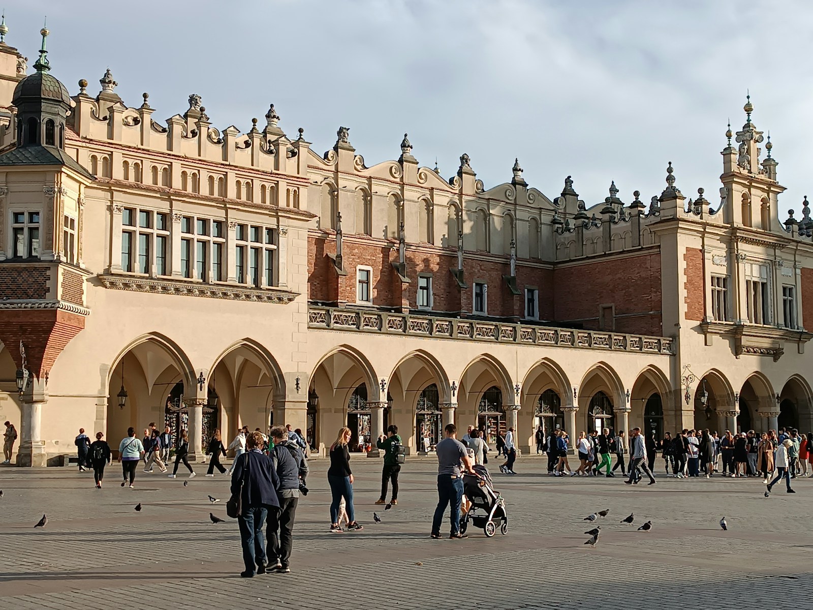 a group of people standing in front of a building