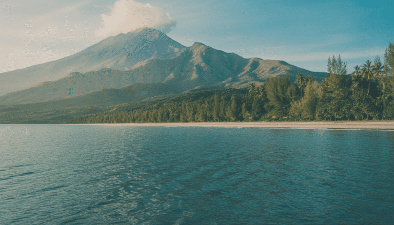 Tropical beach with white sand, turquoise waters and Mount Rinjani
